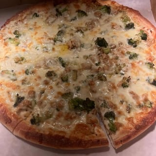 Sun's Alfredo Supreme Pizza